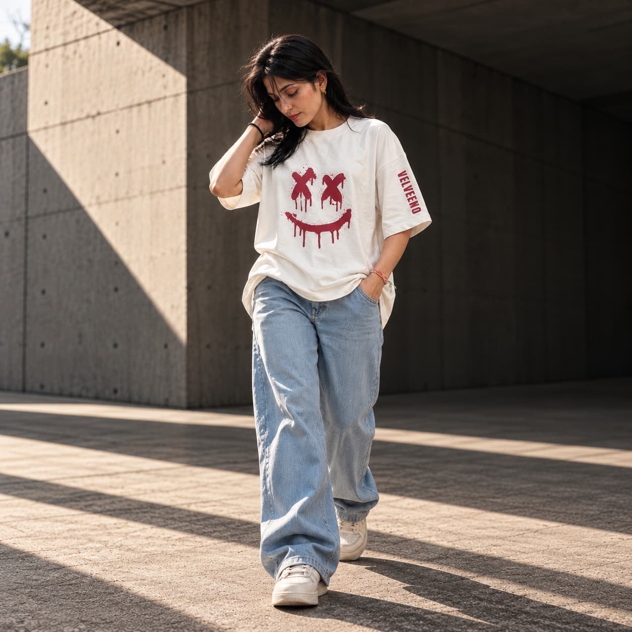 Oxblood streetwear in brutalist sunlight